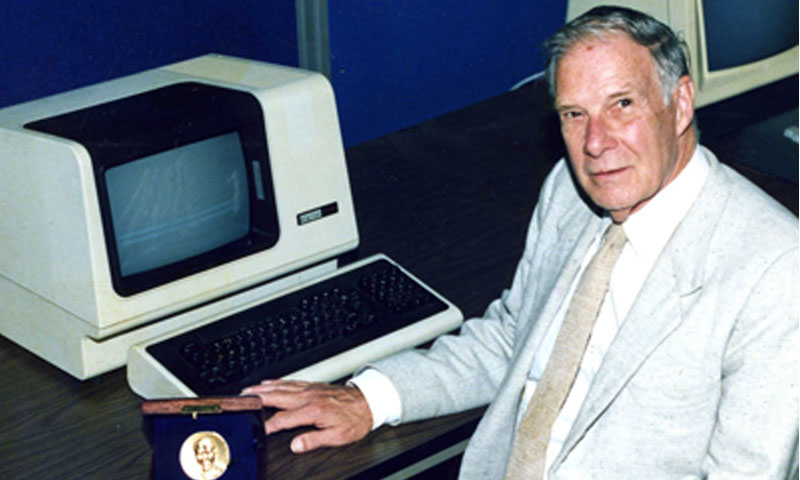 Hamming is pictured with the IEEE Hamming Medal in an NPS laboratory following the award’s establishment in 1986. In addition to being its first recipient, Hamming was presented with several other honors and awards, including ACM’s prestigious Turing Award, and was elected to the National Academy of Engineering.